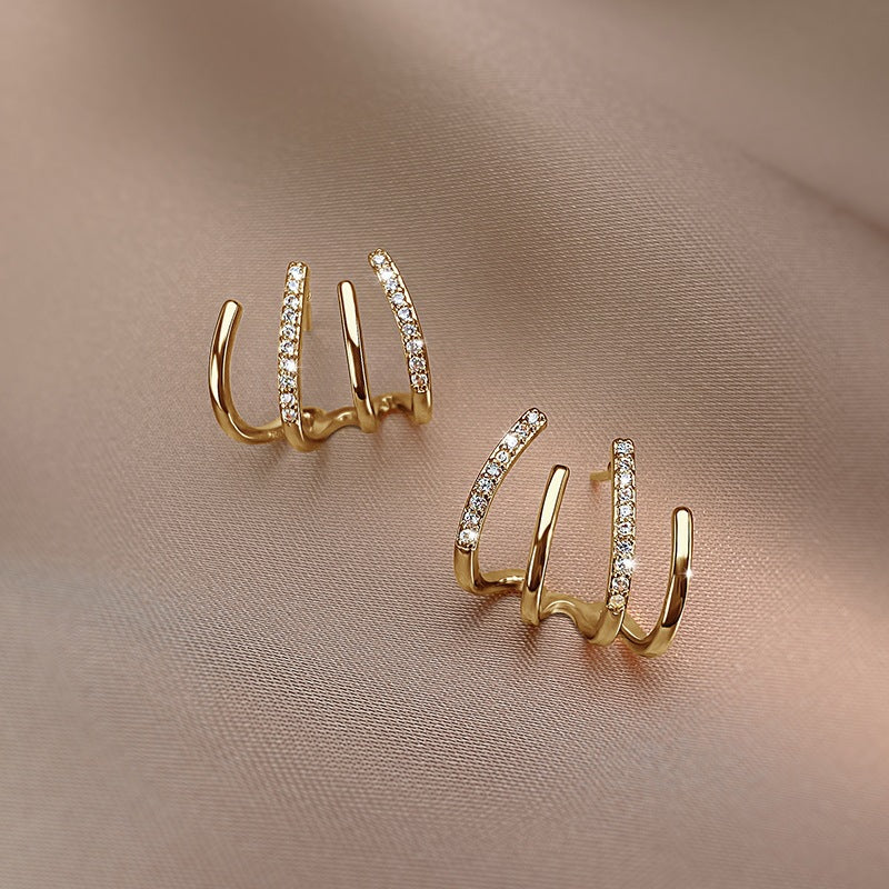 2023 New Trendy Four-Claw Earrings Women's Spring And Summer Niche Sterling Silver Ear Studs Elegant Design Sense Earrings Advanced Ear Row