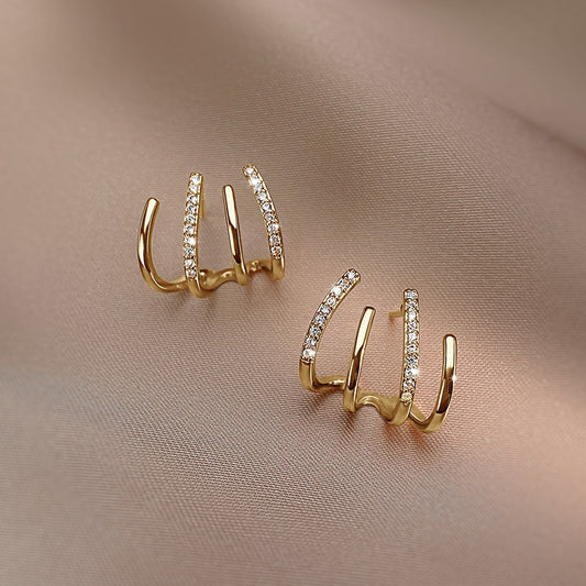 2023 New Trendy Four-Claw Earrings Women's Spring And Summer Niche Sterling Silver Ear Studs Elegant Design Sense Earrings Advanced Ear Row