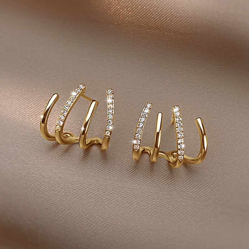 2023 New Trendy Four-Claw Earrings Women's Spring And Summer Niche Sterling Silver Ear Studs Elegant Design Sense Earrings Advanced Ear Row