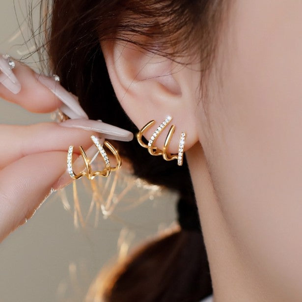 2023 New Trendy Four-Claw Earrings Women's Spring And Summer Niche Sterling Silver Ear Studs Elegant Design Sense Earrings Advanced Ear Row